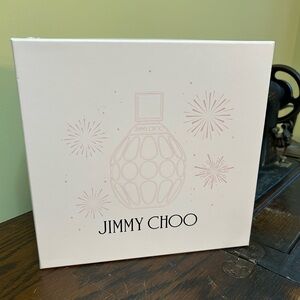 Jimmy Choo White and Pink lotion and fragrance set.